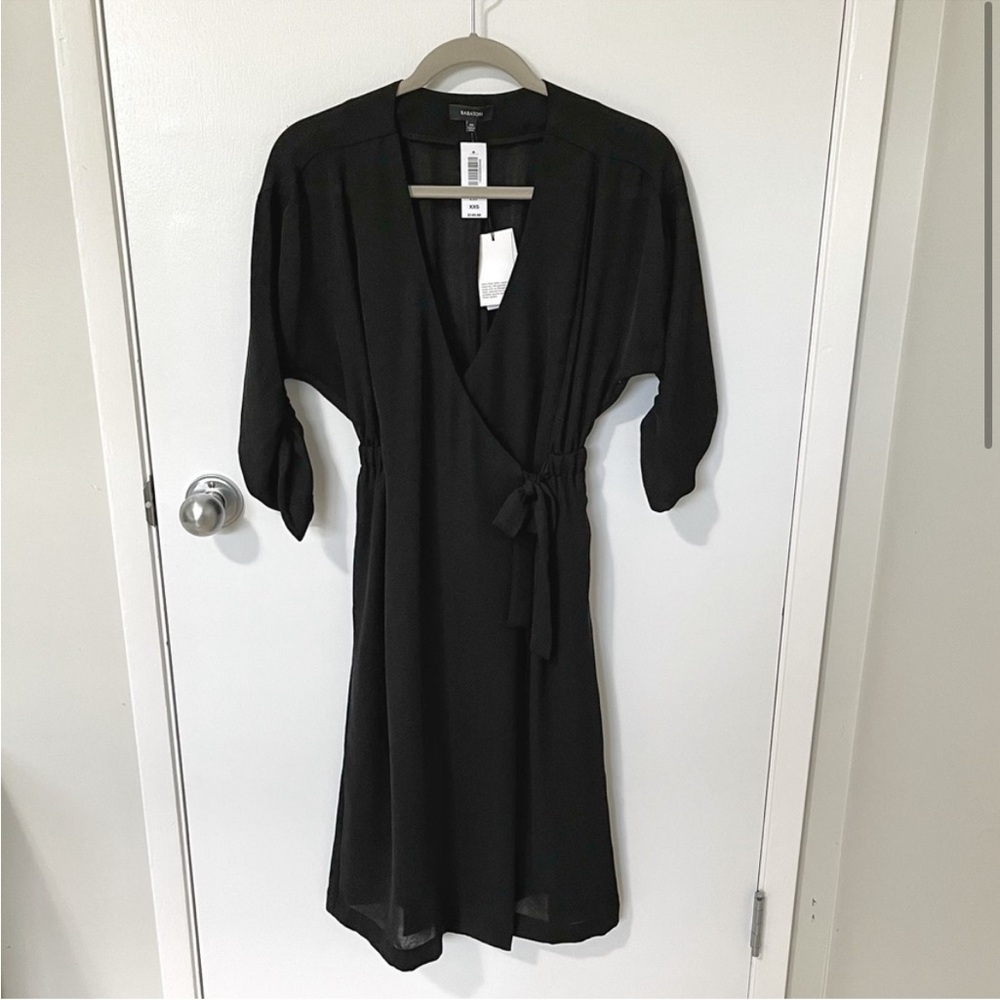 NWT Aritzia Babaton Ludovic V-Neck Wrap Dress
Black XXSmall - Picture 3 of 16